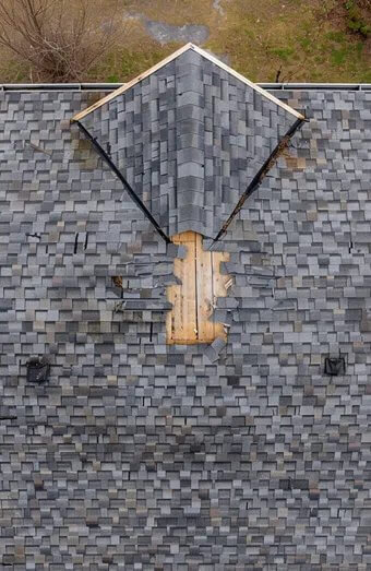 Storm Damage Roof Repair X